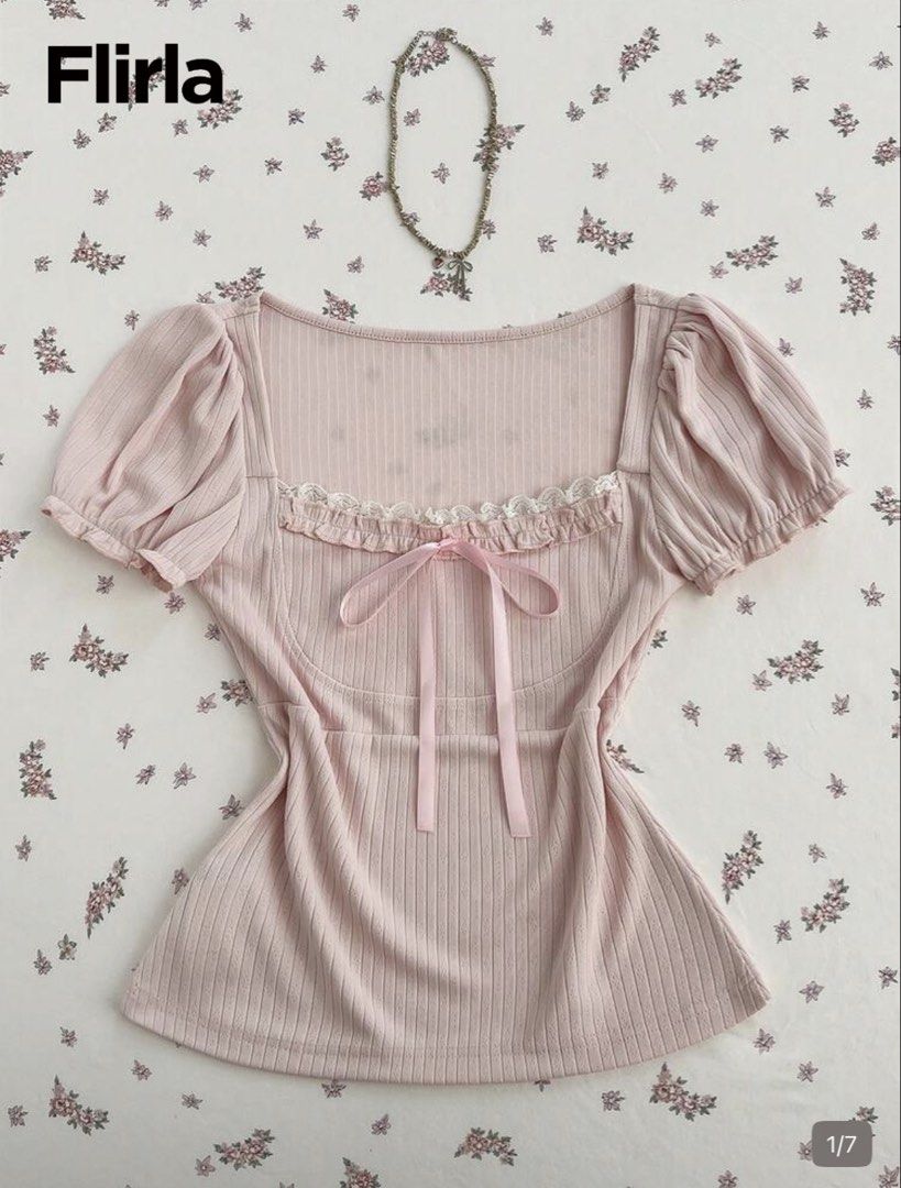 Flirla Pink Puff Sleeve Square Neck Top with Bow (Category: Blouses) located in Caloocan City. Submitted by nessymawi (Listing ID 1454623586, Image 1). Description: - Cute pink top from Flirla - Features puff sleeves and a square neckline - Adorned with lace trim and a front ribbon bow detail - Made from comfortable ribbed material - Ideal for a sweet and feminine look - Refer to size chart for exact measurements RFS: Wrong size 😔.