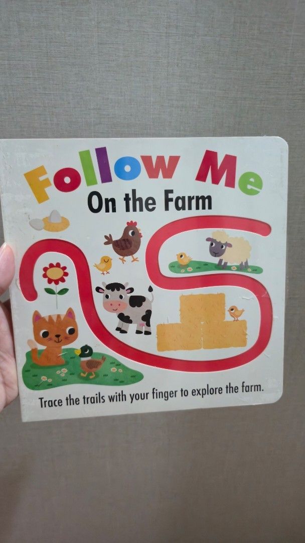 Follow Me On the Farm Interactive Board Book (Category: Children's Books) located in Malabon City. Submitted by emmashappymommy (Listing ID 1454586016, Image 1). Description: - Interactive board book perfect for little hands. - Features engaging farm trails to trace with a finger. - Helps develop pre-writing skills and early hand-eye coordination. - Ideal for toddlers and preschoolers (ages 2-5). .