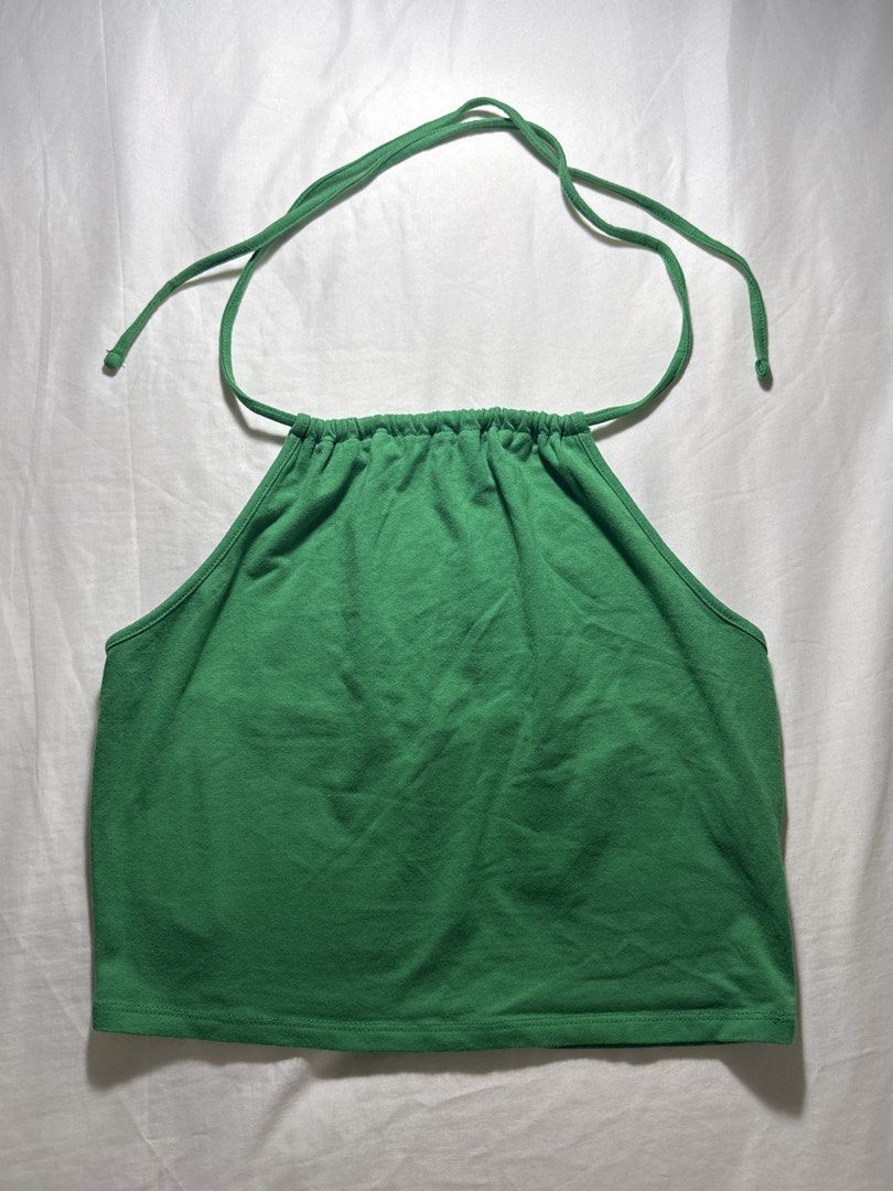 Forever 21 Green Halter Neck Crop Top - Size M (Category: Sleeveless) located in Quezon City. Submitted by minispirea (Listing ID 1454718575, Image 1). Description: • On hand & ready to ship • More photos/videos available upon request • Pay as you order • No returns or exchanges Location: Quezon City / BGC Delivery: • Weekdays — same-day evening or next-day delivery due to work • Weekends — anytime For proof of previous transactions, check @minis
