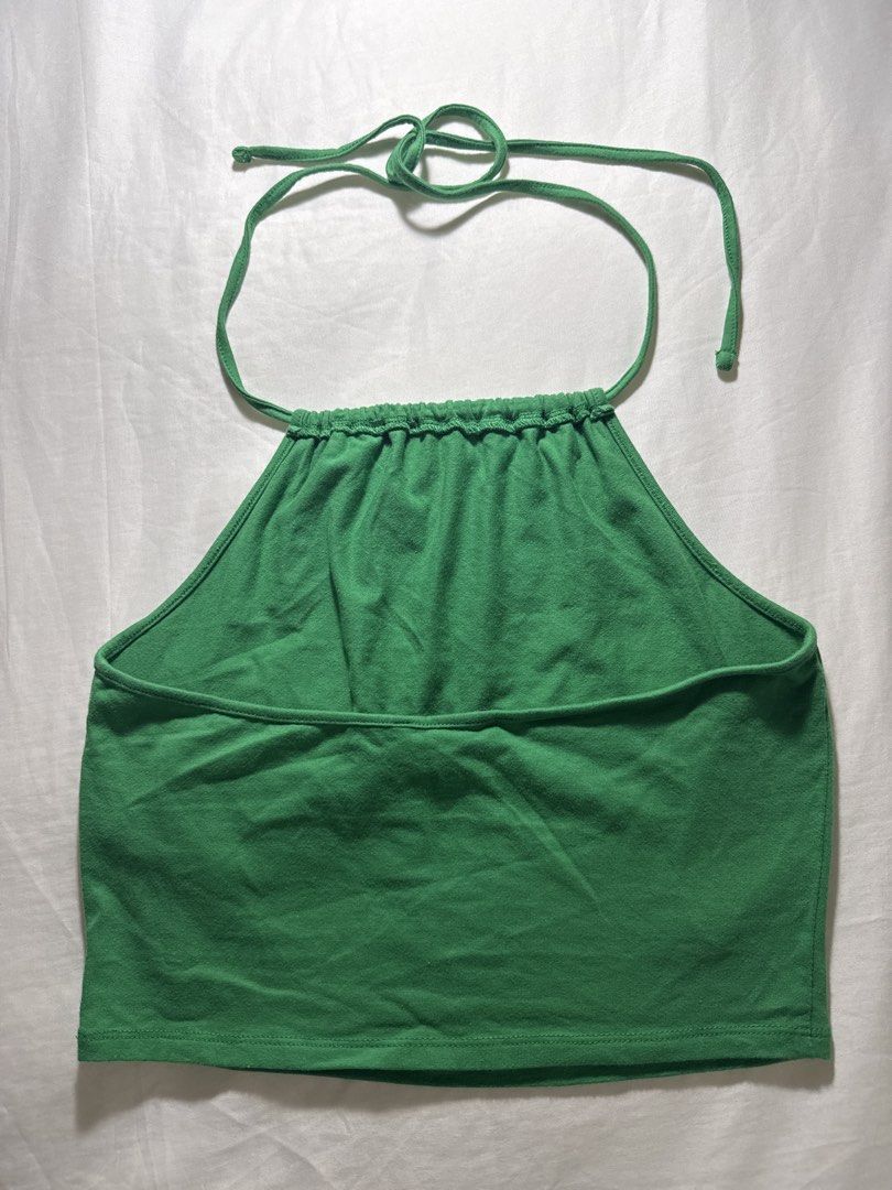 Forever 21 Green Halter Neck Crop Top - Size M (Category: Sleeveless) located in Quezon City. Submitted by minispirea (Listing ID 1454718575, Image 2). Description: • On hand & ready to ship • More photos/videos available upon request • Pay as you order • No returns or exchanges Location: Quezon City / BGC Delivery: • Weekdays — same-day evening or next-day delivery due to work • Weekends — anytime For proof of previous transactions, check @minis