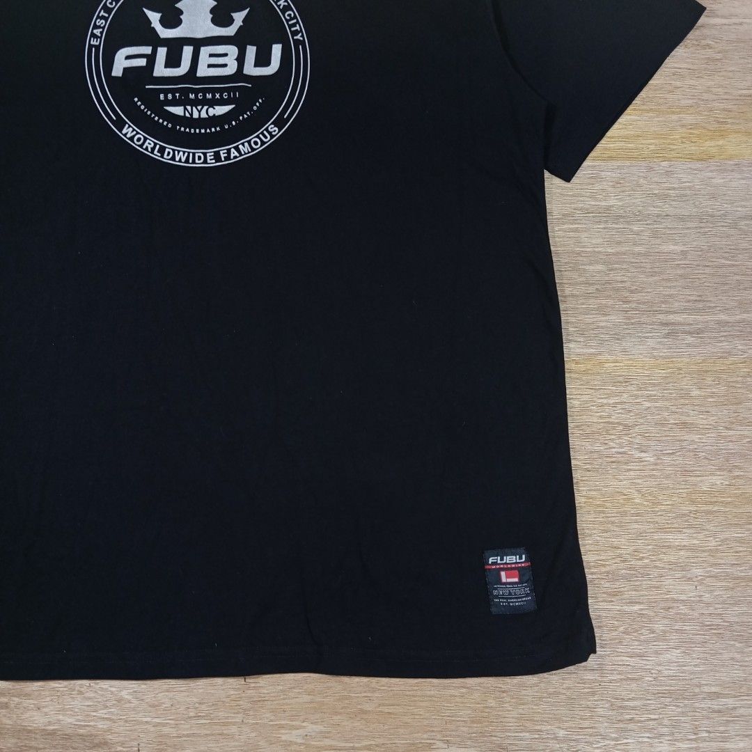 Fubu T-shirt (Category: Activewear) located in Manila. Submitted by sito. (Listing ID 1454715672, Image 2). Description: Fubu T-shirt Size: Large Length: 33.5 Width: 26 Color rate: 10/10 Issue: 1 pinhole Good Condition 🏷️ : ₱ 369 📦 : PLUS SHIPPING FEE 📍 : Upper Bicutan, Taguig City This piece is PRIZE, We can deal, Mate! Hit the message so we can Negotiate. Thanks, have a blessed day to all! 🙇🏽.