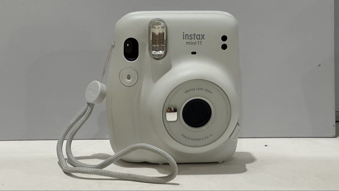 Fujifilm Instax Mini 11 Ice White (Category: Cameras) located in Baguio. Submitted by itstrishhhh (Listing ID 1454622678, Image 2). Description: 📷 Fujifilm Instax Mini 11 — Ice White 💰 ₱3,000 negotiable for sure buyers Condition: 9/10 • Fully functional • Well-maintained • Clean lens & camera body • No major dents or scratches • ⚠️ Slight yellowing/discoloration on some surrounding/outer areas due to age • Original box has some signs of storage