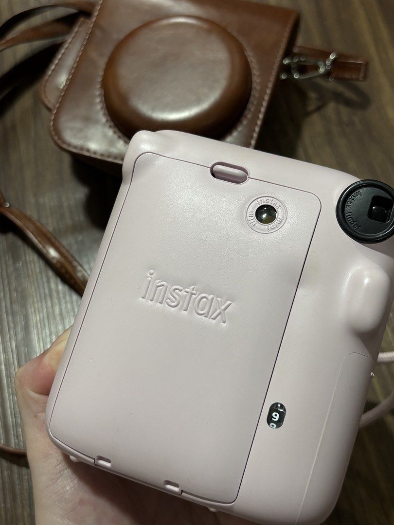 Fujifilm Instax Mini 12 Pink (Category: Cameras) located in Marikina City. Submitted by larafinds (Listing ID 1454741660, Image 2). Description: Rfs: Decluttering INSTAX MINI 12 PINK - Rarely used - No issue, lady - With film pang laman, can use for test shots Inclusions: - Unit with battery - Leather Case 📍Marikina City.