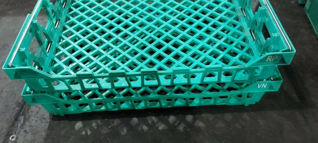 Green Plastic Crates for Storage or Display (Category: Storage Boxes & Baskets) located in Valenzuela. Submitted by newbear.425b6e (Listing ID 1454694048, Image 2). Description: - Stackable green plastic crates - Ideal for organizing or displaying items - Open grid design for ventilation - Built-in side handles for easy carrying - Multiple units available (message for bulk orders) -surplus 300 each. wala po damage in good condition po lahat..