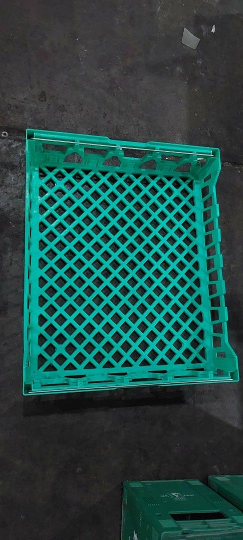 Green Plastic Crates for Storage or Display (Category: Storage Boxes & Baskets) located in Valenzuela. Submitted by newbear.425b6e (Listing ID 1454694048, Image 1). Description: - Stackable green plastic crates - Ideal for organizing or displaying items - Open grid design for ventilation - Built-in side handles for easy carrying - Multiple units available (message for bulk orders) -surplus 300 each. wala po damage in good condition po lahat..