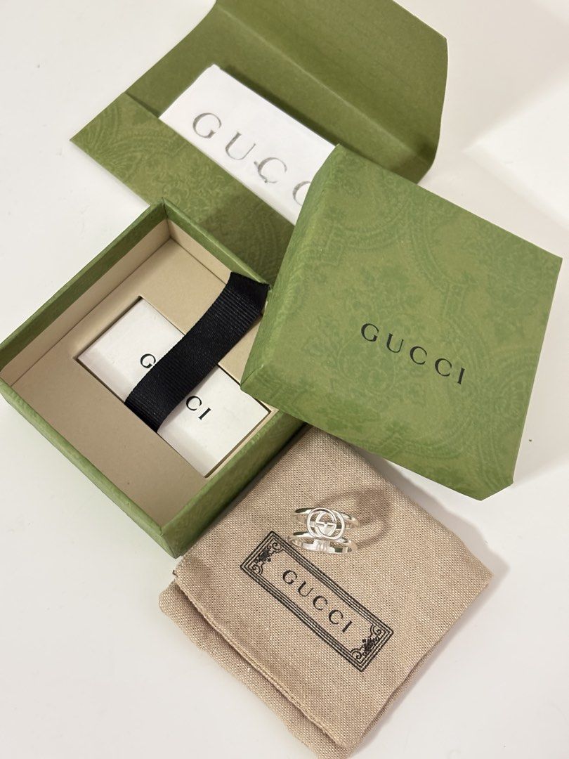 Gucci Interlocking Ring (Category: Rings) located in Singapore. Submitted by cassettepod (Listing ID 1454588799, Image 4). Description: Just sent for polishing, ready to wear. Gucci Interlocking ring size 18, sterling silver 925. Only worn a few times. Comes with full packaging, box & ring pouch. Original price $600, selling for $450, no nego. Only for serious buyers :) .