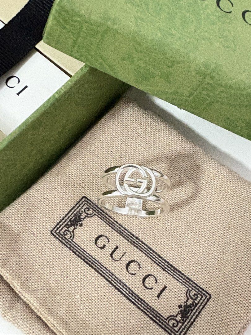 Gucci Interlocking Ring (Category: Rings) located in Singapore. Submitted by cassettepod (Listing ID 1454588799, Image 3). Description: Just sent for polishing, ready to wear. Gucci Interlocking ring size 18, sterling silver 925. Only worn a few times. Comes with full packaging, box & ring pouch. Original price $600, selling for $490, no nego. Only for serious buyers :) .