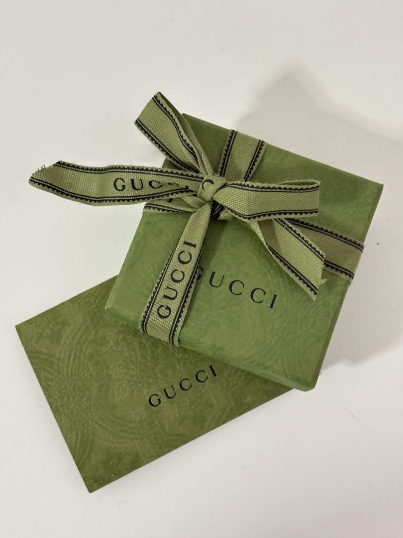 Gucci Interlocking Ring (Category: Rings) located in Singapore. Submitted by cassettepod (Listing ID 1454588799, Image 5). Description: Just sent for polishing, ready to wear. Gucci Interlocking ring size 18, sterling silver 925. Only worn a few times. Comes with full packaging, box & ring pouch. Original price $600, selling for $450, no nego. Only for serious buyers :) .