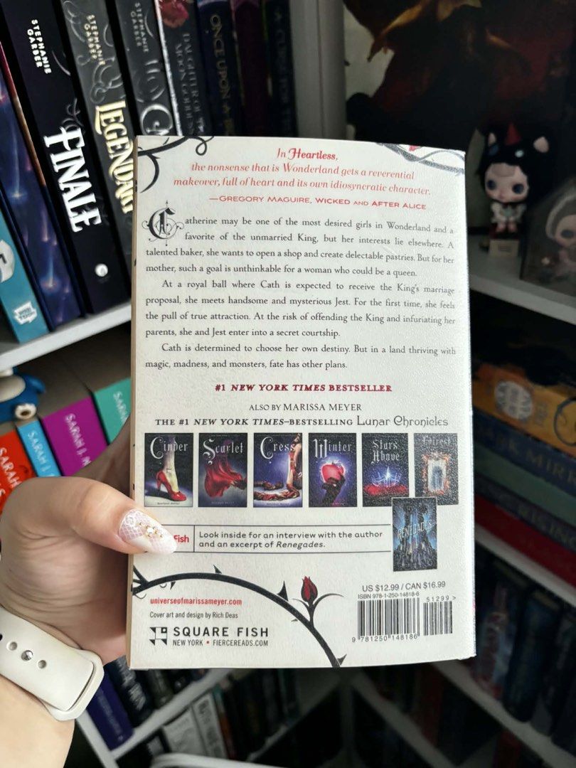 Heartless by Marissa Meyer - The Lunar Chronicles Prequel (Category: Storybooks) located in Taguig. Submitted by deyns_clutter (Listing ID 1454602049, Image 3). Description: - Title: Heartless - Author: Marissa Meyer - Series: Prequel to The Lunar Chronicles - Story Focus: The origin of the Queen of Hearts - Condition: Great, with clean pages and a tight binding - Ideal For: Fans of fantasy and fairy tales.
