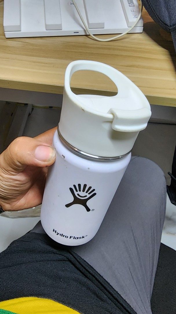 Hydro Flask White Water Bottle with Flip Lid (Category: Water Bottles & Tumblers) located in Manila. Submitted by karlmark132527 (Listing ID 1454652382, Image 2). Description: - White Hydro Flask water bottle - Features a convenient flip-top lid for easy drinking - Minor scuffs and marks on exterior from normal use - Excellent performance: keeps drinks cold or hot - Ideal for everyday hydration needs.