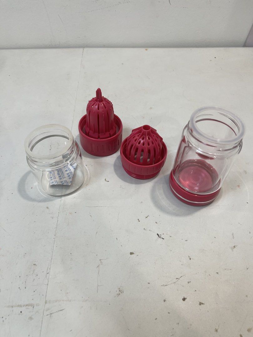 Infuser Water Bottle with Fruit Strainer (Category: Water Bottles & Tumblers) located in Quezon City. Submitted by mitchabrio (Listing ID 1454606224, Image 3). Description: - Reusable water bottle with built-in infuser - Perfect for fruit-infused water or tea - Detachable parts for easy cleaning - Red infuser includes a lid - Clear glass bottle features a pink band - Ideal for staying hydrated anywhere.