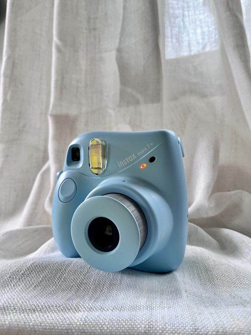 Instax Mini 7+ (Category: Cameras) located in Vigan. Submitted by chiechiero (Listing ID 1454670777, Image 2). Description: Instax mini 7+ w/ camera bag •used 3x •no polaroid included.
