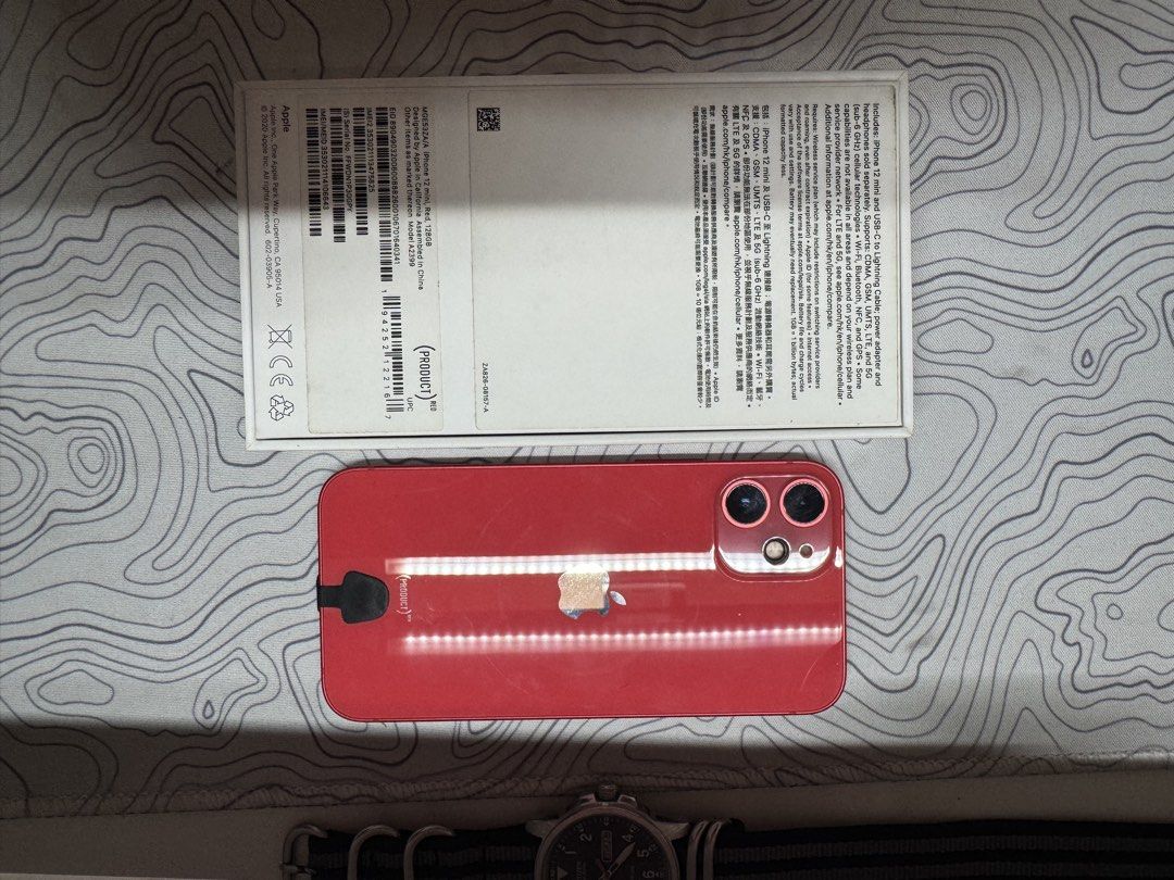 iPhone 12 mini product red 128gb (Category: iPhone 12 Series) located in Quezon City. Submitted by transmactic (Listing ID 1454696223, Image 3). Description: For sale is an iphone 12 mini 128gb. Almost cosmetically flawless since it has tempered glass and an otterbox case since day 1. All functions work perfectly. This unit is openline. Perfect as a phone when going abroad. Will throw in a free brand new otterbox commuter case. The old one has be