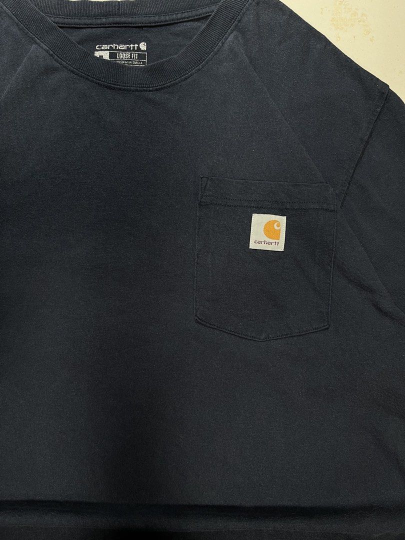 K87 CARHARTT POCKET TEE (Category: Tshirts & Polo Shirts ) located in Bangued. Submitted by seconde_official (Listing ID 1454730137, Image 2). Description: Size: Medium - Large Length: 31 inches Width: 24 inches Color rate: 8/10 Issue: No issue.