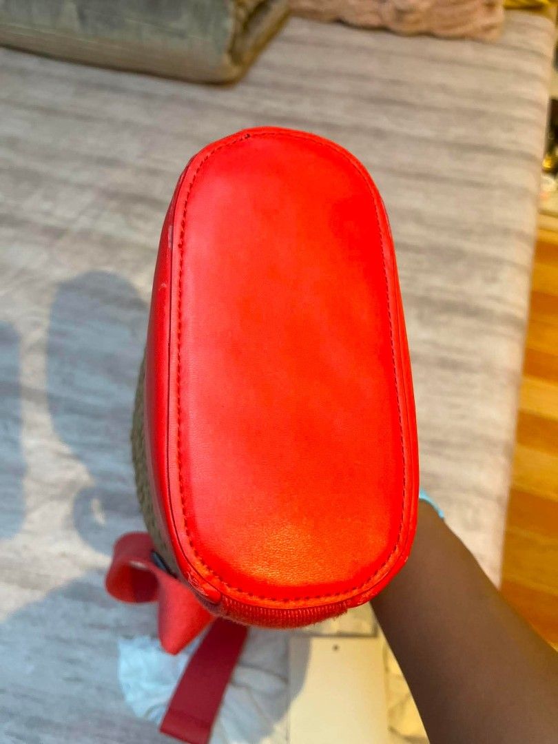 Kenzo Straw Bag with Red Leather Trim (Category: Luxury Bags & Wallets) located in Marikina City. Submitted by kgcdl (Listing ID 1454722497, Image 2). Description: - Adorable Kenzo straw bag - Features red leather trim - Iconic white KENZO logo - Comes with a drawstring dust bag.