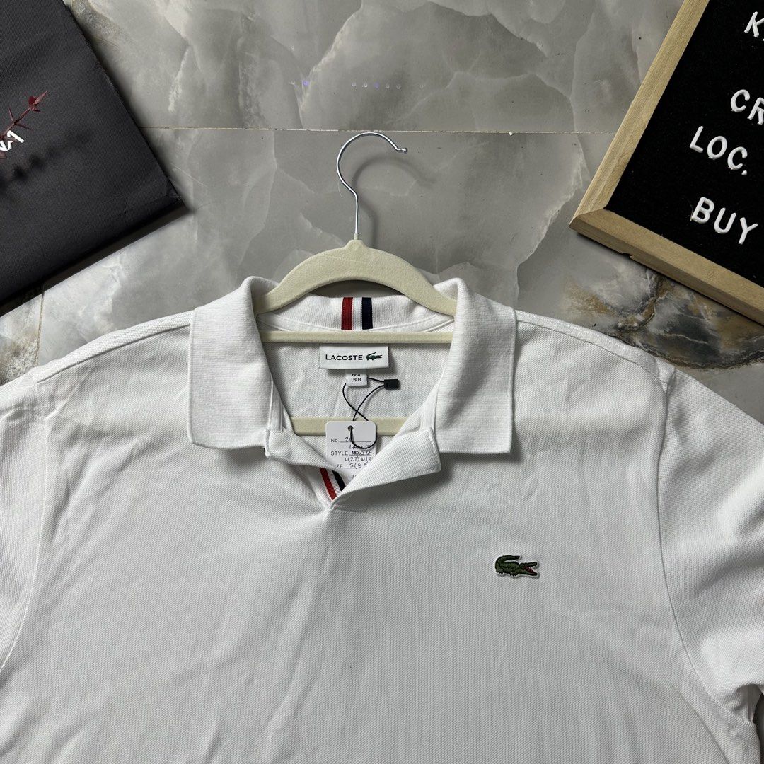 Lacoste White Polo Shirt (Category: Tshirts & Polo Shirts ) located in Baguio. Submitted by kayeonlineshop (Listing ID 1454677164, Image 2). Description: 🛍️ Classic Short Sleeve 🛍️ Preowned authentic 🛍️ Regular Casual Out Fit 🛍️ Medium size 🛍️ L-27”, W-21”, S-8.5” 💰1,450.00 FREE SF.