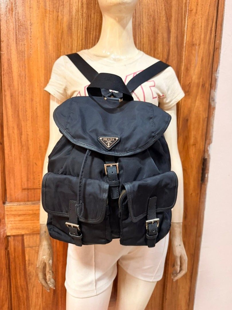 [lampo under zip] Prada backpack (Category: Backpacks) located in Surigao. Submitted by lilowearph (Listing ID 1454653459, Image 1). Description: Black na black.