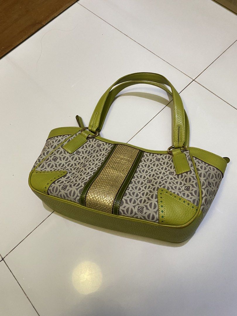 Louis Quatorze Monogram Shoulder Bag (Category: Luxury Bags & Wallets) located in Marikina City. Submitted by heaven.2397 (Listing ID 1454675972, Image 1). Description: - Lime green Louis Quatorze shoulder bag - Signature monogram pattern - Gold accent strip in the middle - Leather trim and handles - Multiple interior pockets - Zipper closure - Ideal for everyday use I got this bag secondhand for 1500 and selling it for only 500 since im declutte