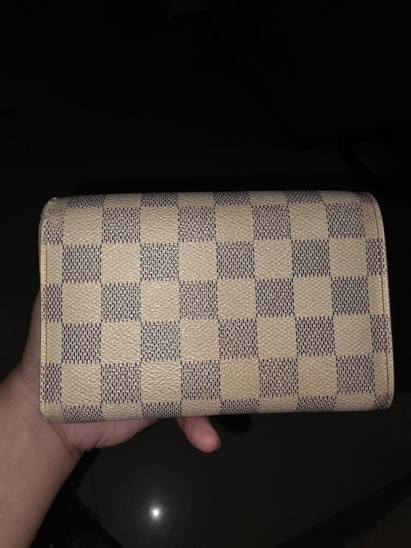 Louis Vuitton Damier Azur Canvas Wallet (Category: Luxury Bags & Wallets) located in Paranaque City. Submitted by usedwthlove (Listing ID 1454664932, Image 3). Description: - Original Louis Vuitton wallet in Damier Azur canvas - Project Wallet - Secure snap closure - Multiple interior card slots - Zippered coin pocket - See flaws on pics - Fully functional and stylish - Sold as is ❌️NO FAKES HERE❌️.