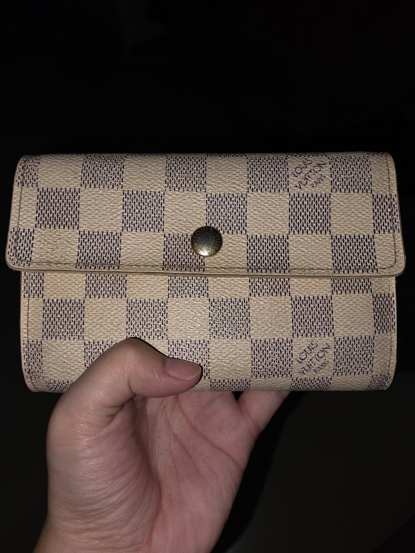 Louis Vuitton Damier Azur Canvas Wallet (Category: Luxury Bags & Wallets) located in Paranaque City. Submitted by usedwthlove (Listing ID 1454664932, Image 1). Description: - Original Louis Vuitton wallet in Damier Azur canvas - Project Wallet - Secure snap closure - Multiple interior card slots - Zippered coin pocket - See flaws on pics - Fully functional and stylish - Sold as is ❌️NO FAKES HERE❌️.