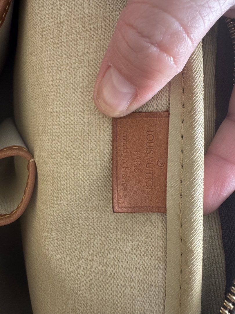 Louis Vuitton Deauville Monogram Handbag (Category: Luxury Bags & Wallets) located in Dasmarinas. Submitted by rinz0man (Listing ID 1454620918, Image 2). Description: - Classic Louis Vuitton monogram canvas handbag - Genuine leather trim and handles - Lined interior - Made in France - Ample space for essentials - A timeless addition to any collection.