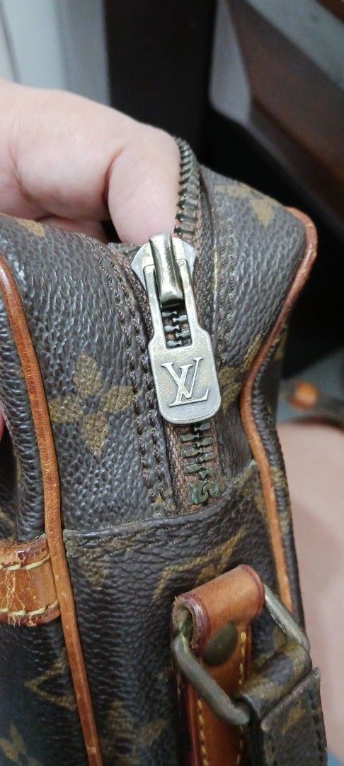 Louis Vuitton Monogram Canvas Crossbody Bag (Category: Luxury Bags & Wallets) located in Koronadal. Submitted by milagraciaukayukay123_. (Listing ID 1454647474, Image 3). Description: - Guaranteed authentic 💯 - Classic Louis Vuitton monogram canvas crossbody bag - Leather trim and strap - Zipper closure - Interior shows some signs of wear - Zipper pull features LV logo - Made in Switzerland - Perfect for everyday use.