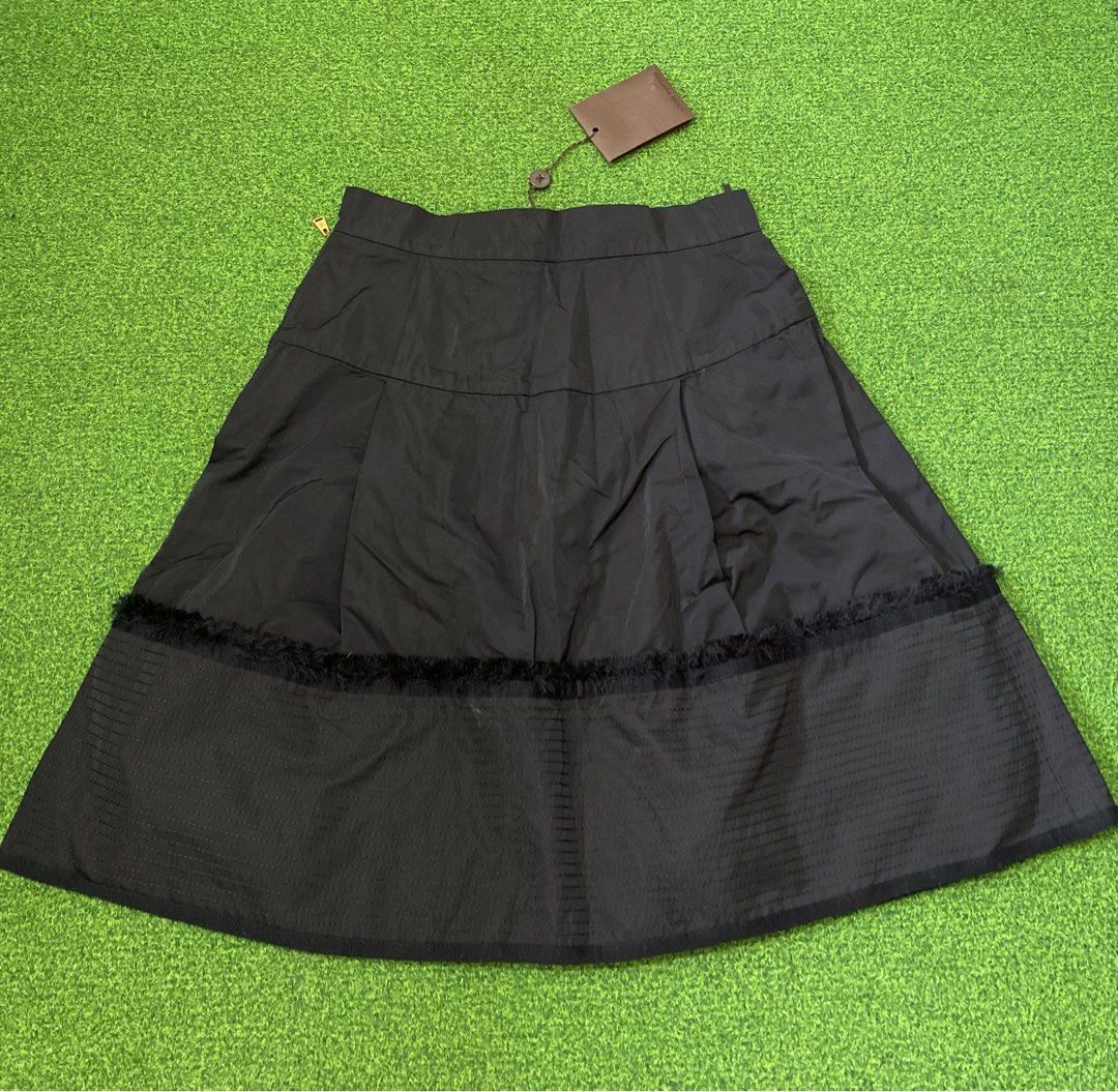 Louis Vuitton Skirt (Category: Luxury Apparel) located in Manila. Submitted by victory_1816 (Listing ID 1454633884, Image 1). Description: Elegant and timeless Louis Vuitton skirt, size 38, in classic black. Beautifully designed with a feminine silhouette, quality detailing, and signature Louis Vuitton finishing. ⭐️Made in France ⭐️Size 38 ⭐️70% Polyester / 30% Silk ⭐️Gold tone LV hardware and zipper ⭐️Comes with Louis Vuitton care card, extra th