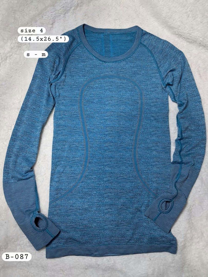 Lululemon Athletica Long Sleeve Top Size 4 Blue (Category: Activewear) located in Baguio. Submitted by padisellsz (Listing ID 1454640981, Image 3). Description: - Blue Lululemon long sleeve top - Very good condition - Mejo nabubura lang yung logo sa likod - Size 4 (fits like a Small to Medium) - Features thumbholes for added warmth - "Push Your Pace" and "set your goals. Do it now." printed on the hem - Versatile for workouts or casual wear.