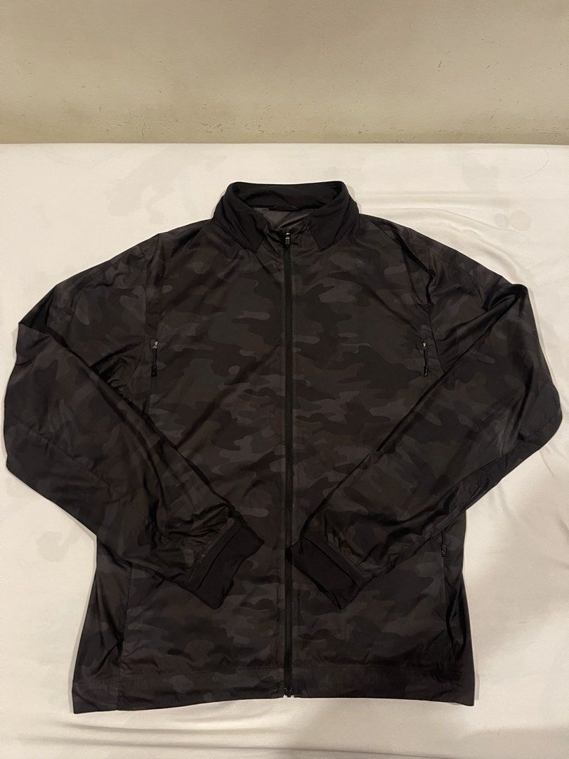 Lululemon Running/Active Jacket (Category: Activewear) located in Quezon City. Submitted by yuuuujiro.hanma (Listing ID 1454698092, Image 1). Description: Lululemon Surge jacket camo - 27x22 inches - Rarely used - Good condition - very lightweight - ventilated.