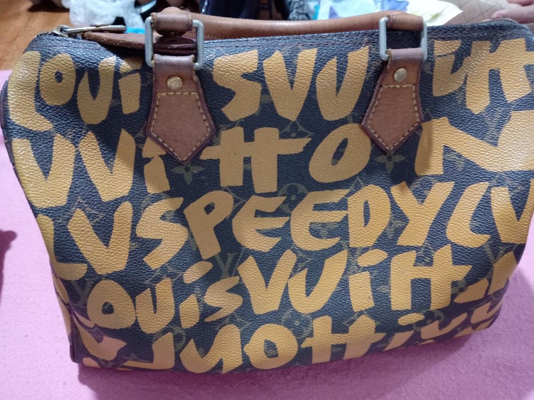 LV graffiti speedy 30 (Category: Luxury Bags & Wallets) located in Malolos. Submitted by shoptokyothrift (Listing ID 1454606917, Image 1). Description: AS IS Louis Vuitton x Stephen Sprouse Graffiti Speedy 30 Coded 2001 limited-edition/vintage Monogram coated canvas + brown leather trim Gold-tone hardware leather has significant cracking/wear and interior shows wear.