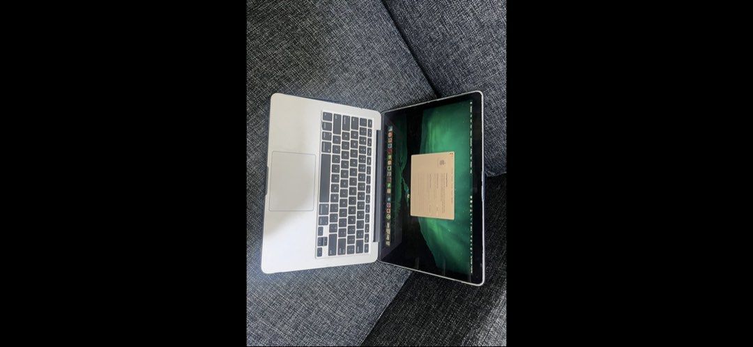 Macbook Pro 2015 (Category: Laptops & Notebooks) located in Quezon City. Submitted by fiercemoon.1bb3de (Listing ID 1454750380, Image 2). Description: Used macbook laptop with charger. No box. The anti glare can be seen in the monitor and the sound system is garbled but other than this the laptop is ok. .
