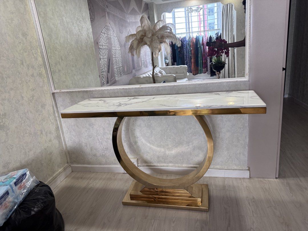 Marble console table (Category: Tables & Sets) located in Singapore. Submitted by surajudensuhail (Listing ID 1454576771, Image 3). Description: W 140cm H85cm D 40cm Pls arrange your own transportation .