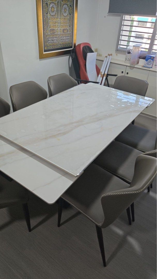 Dining Table (Category: Tables & Sets) located in Singapore. Submitted by shidxh (Listing ID 1454566599, Image 1). Description: - Marble effect dining table with glossy finish - Comfortably seats 6 people - Extandable up to 2m, seats 8 people. Before extending: 1.4m x 90cm - Selling dining table only - Ideal for family meals and entertaining - Fast deal with delivery - Nego (delivery not provided).