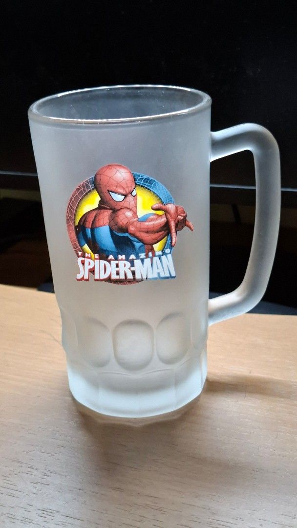 Marvel Spiderman Frosted Mug (Category: Coffee & Tea Tableware) located in Quezon City. Submitted by koloshop (Listing ID 1454652449, Image 2). Description: - Cool frosted glass mug featuring Spiderman - Suitable for cold drinks, ice cream, beer, coffee, etc..