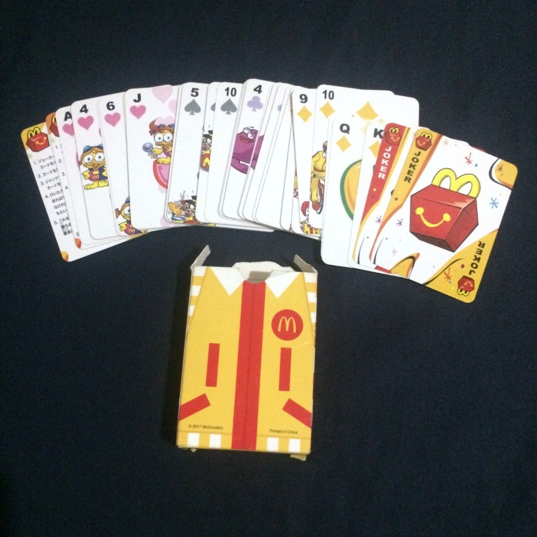 McDonald's Ronald McDonald Playing Cards with Box (Category: Board Games & Puzzles) located in Makati City. Submitted by patientno.9.earth (Listing ID 1454638741, Image 2). Description: McDonald's playing cards featuring Ronald McDonald. Includes the original box. Cards have fun designs and characters. Great for collectors or a fun game night. Box shows some wear but cards look good. Selling as a set..