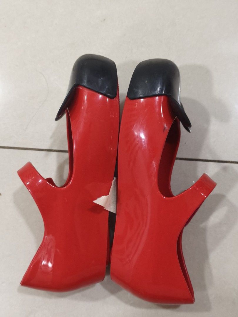 Mini Melissa Mickey Mouse Jelly Shoes Red (Category: Babies & Kids Fashion) located in Manila. Submitted by katie09871234 (Listing ID 1454640219, Image 2). Description: - Adorable red jelly shoes from Mini Melissa. - Features a fun Mickey Mouse design. - Easy-to-use velcro strap for secure fit. - Perfect for your little Disney fan! - Size: 10 US / 25 BRA / 27 EUR. - In good, pre-loved condition..