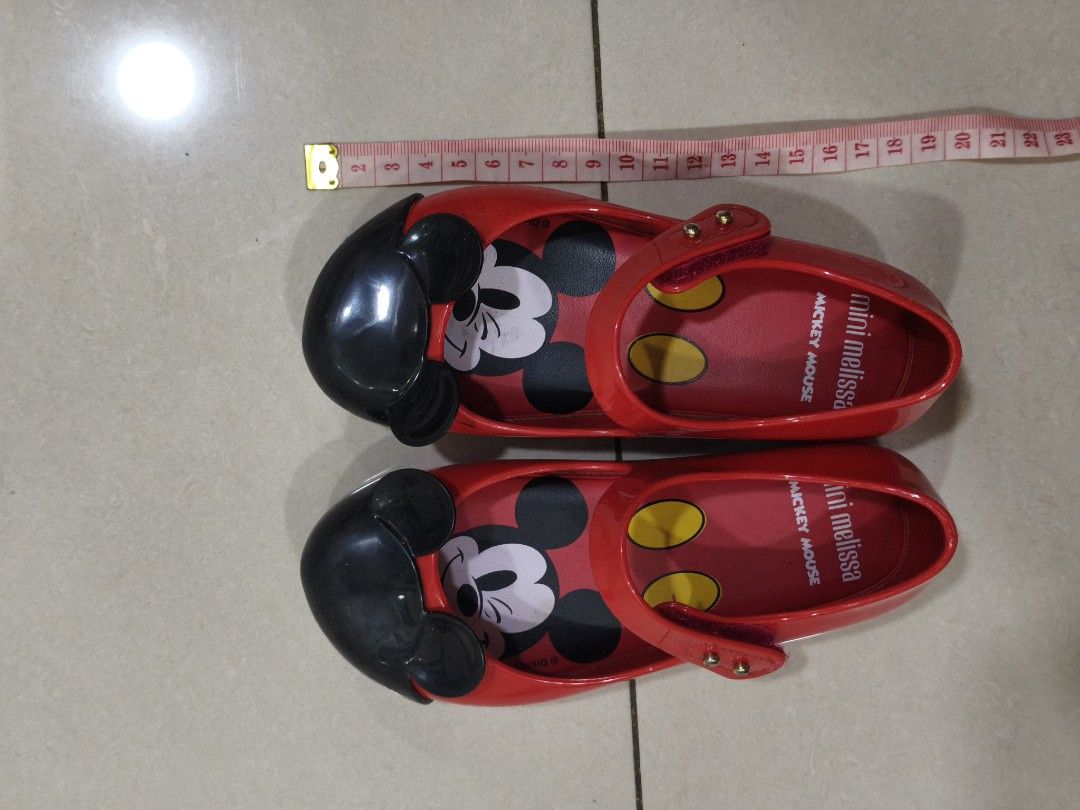 Mini Melissa Mickey Mouse Jelly Shoes Red (Category: Babies & Kids Fashion) located in Manila. Submitted by katie09871234 (Listing ID 1454640219, Image 1). Description: - Adorable red jelly shoes from Mini Melissa. - Features a fun Mickey Mouse design. - Easy-to-use velcro strap for secure fit. - Perfect for your little Disney fan! - Size: 10 US / 25 BRA / 27 EUR. - In good, pre-loved condition..