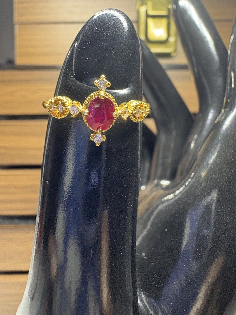 Natural Ruby Ring (Category: Rings) located in Singapore. Submitted by Discoverme (Listing ID 1454735394, Image 2). Description: ❤️ Natural Ruby S925 Ring – Certified This one has a more decorative, luxurious-looking design than the previous ruby ring. The oval natural ruby is framed by sparkling accent stones, with pretty detailing along the band and a rich gold-tone finish. ✨ Natural Ruby ✨ S925 silver base with gold-tone finish ✨ Oval faceted 