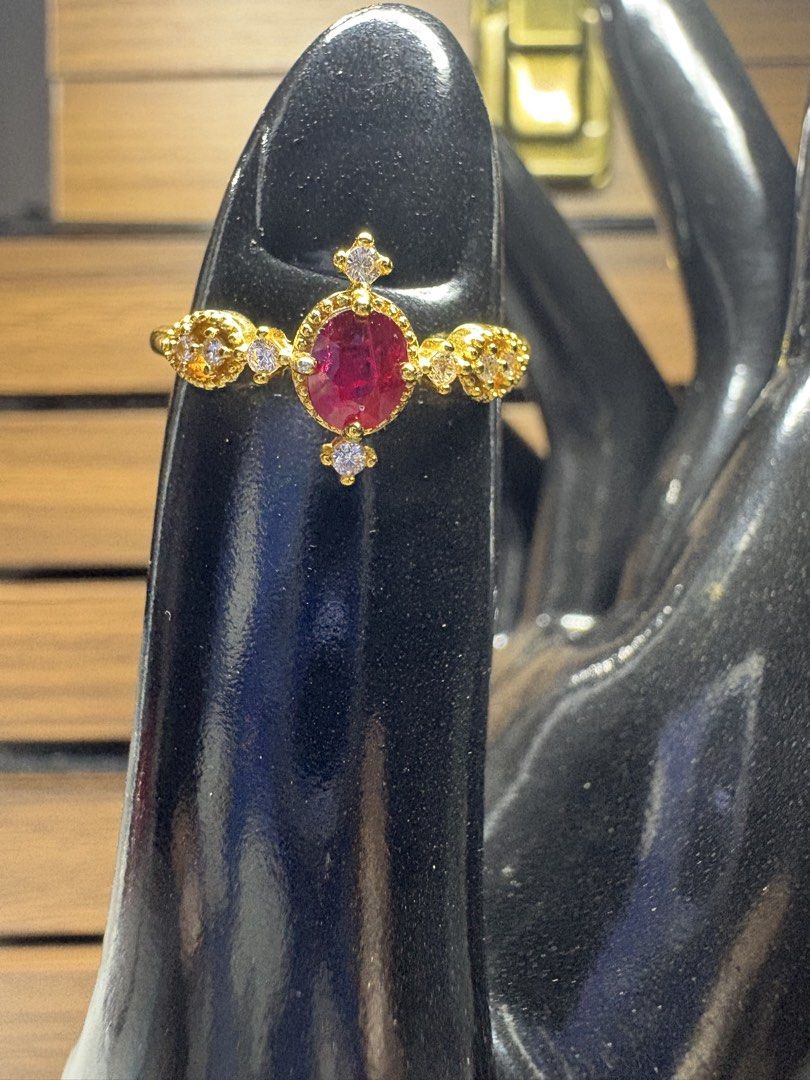Natural Ruby Ring (Category: Rings) located in Singapore. Submitted by Discoverme (Listing ID 1454735394, Image 1). Description: ❤️ Natural Ruby S925 Ring – Certified This one has a more decorative, luxurious-looking design than the previous ruby ring. The oval natural ruby is framed by sparkling accent stones, with pretty detailing along the band and a rich gold-tone finish. ✨ Natural Ruby ✨ S925 silver base with gold-tone finish ✨ Oval faceted 
