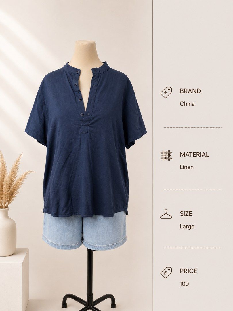 Navy Blue Linen Mandarin Collar Top - Size Large (Category: Blouses) located in San Fernando. Submitted by patrishdg (Listing ID 1454609159, Image 1). Description: - Navy blue top - 100% Linen fabric - Mandarin collar with button details - Short sleeves - Relaxed fit - Ideal for casual outfits - Pairs well with shorts or jeans.
