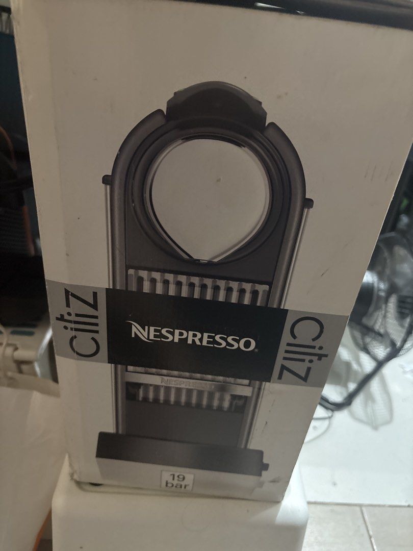 Nespresso Citiz (Category: Coffee Machines & Makers) located in Taguig. Submitted by multiverse2 (Listing ID 1454609330, Image 2). Description: Brand new Nespresso Citiz Color Red Never used Three prong outlet.