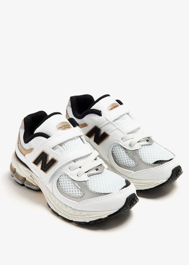 NEW BALANCE 2002R ( YOUTH ) (Category: Sneakers) located in Ozamiz City. Submitted by ClassicDrip (Listing ID 1454686146, Image 3). Description: New Balance 2002R Hook & Loop Little Kid Wide ‘White Black Gold’ PV2002PS -AUTHENTIC / LEGIT 💯 - 2 US / 33.5 EU / 20 CM -Like New Condition -Super nice and presentable in person -Guaranteed worth of money .