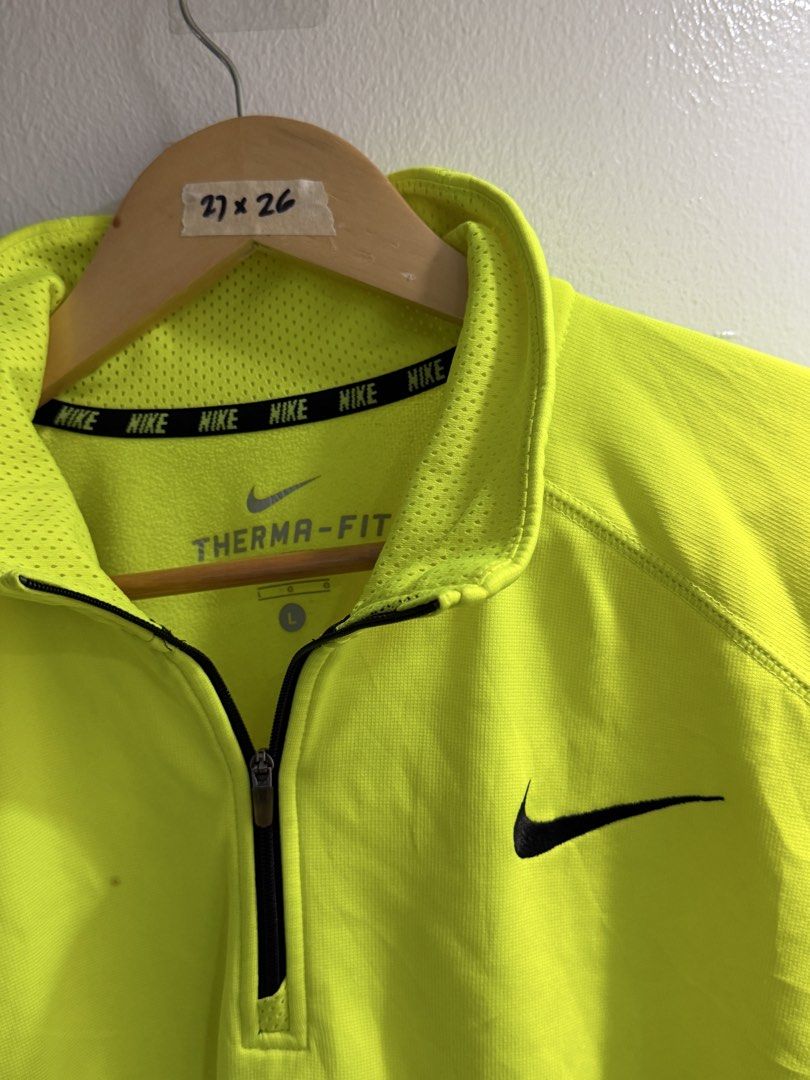 Nike Therma-FIT 1/2 Zip Pullover Jacket Neon Green L (Category: Coats, Jackets and Outerwear) located in Bulacan. Submitted by surewinstuff (Listing ID 1454744322, Image 3). Description: Nike Therma-FIT 1/2 Zip Pullover 💚 Authentic Nike • Size L • Neon Green Excellent preloved condition. Lightweight, sporty & perfect for training, running or casual wear. 📏 Measurements: Pit to pit: 27” Length: 26”.