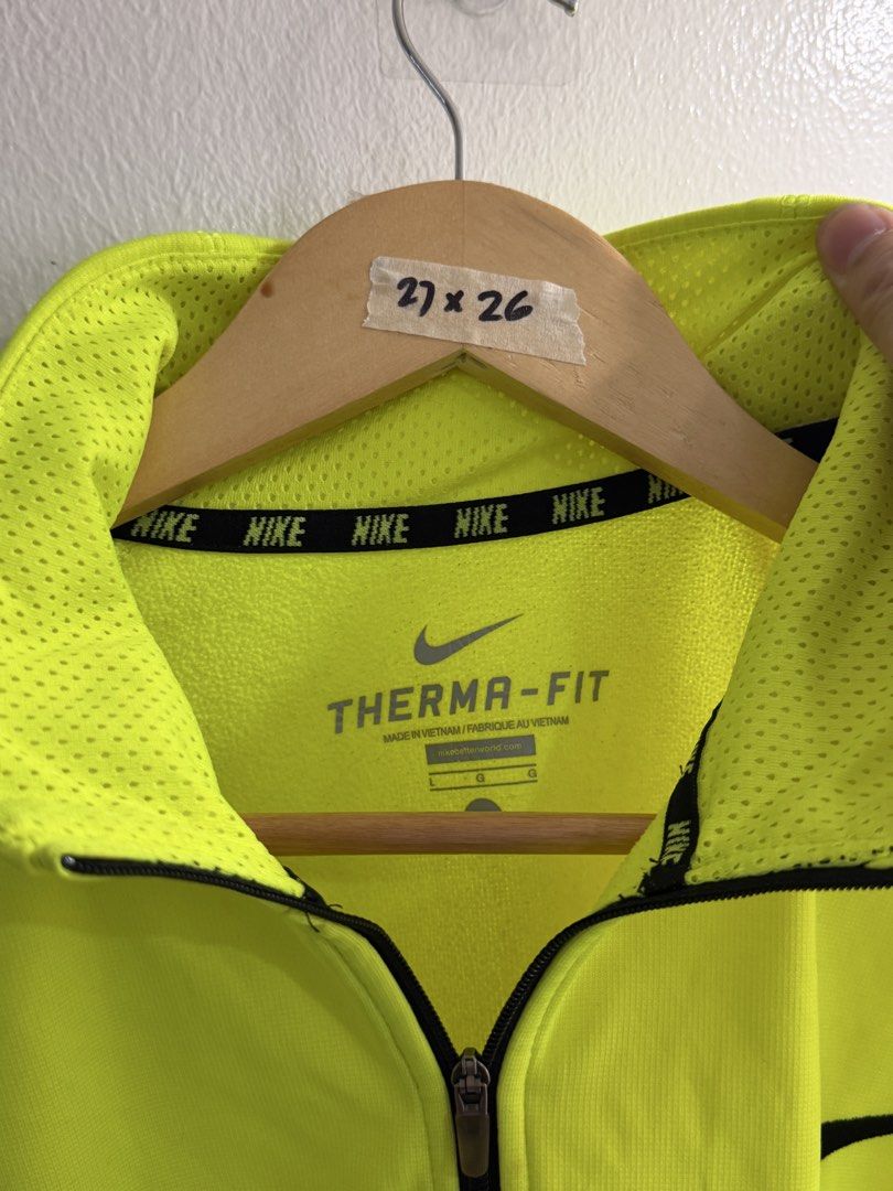 Nike Therma-FIT 1/2 Zip Pullover Jacket Neon Green L (Category: Coats, Jackets and Outerwear) located in Bulacan. Submitted by surewinstuff (Listing ID 1454744322, Image 2). Description: Nike Therma-FIT 1/2 Zip Pullover 💚 Authentic Nike • Size L • Neon Green Excellent preloved condition. Lightweight, sporty & perfect for training, running or casual wear. 📏 Measurements: Pit to pit: 27” Length: 26”.