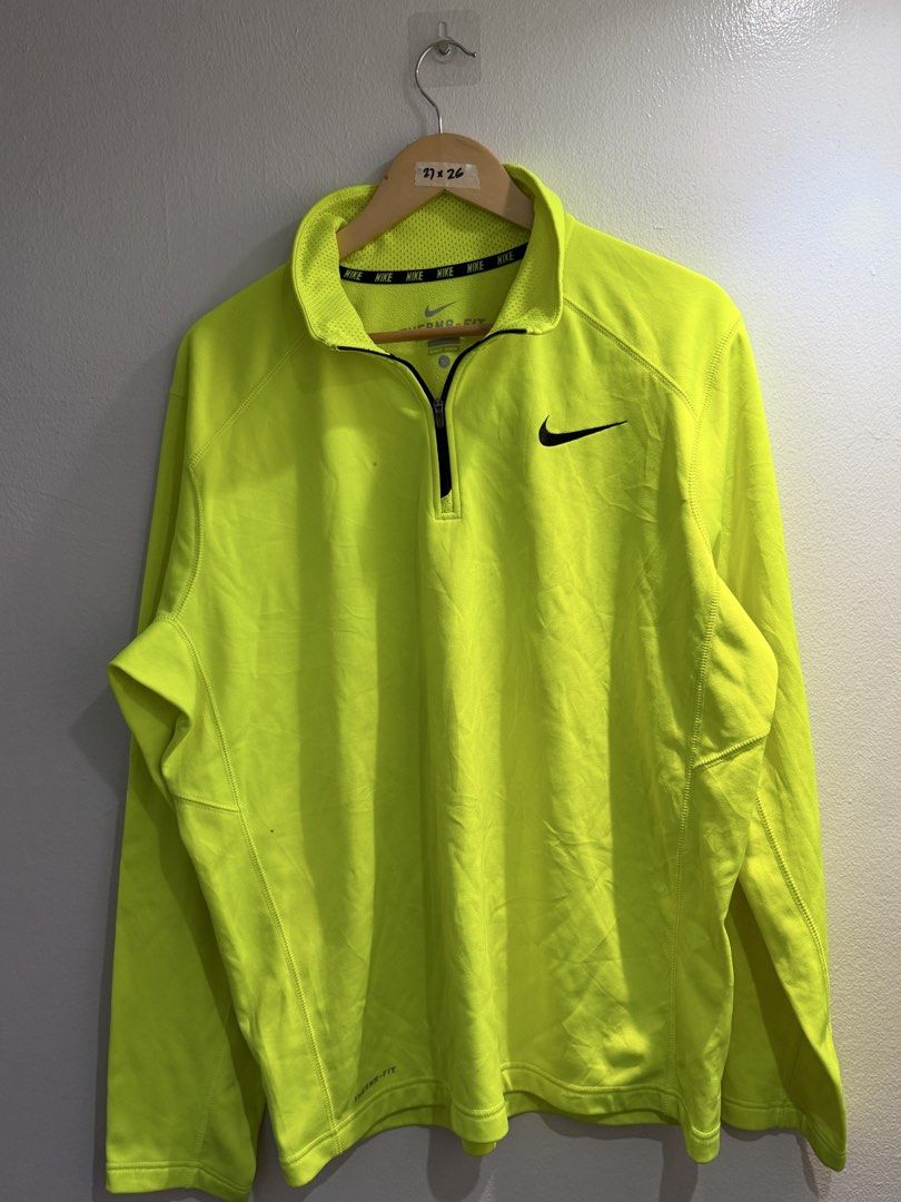 Nike Therma-FIT 1/2 Zip Pullover Jacket Neon Green L (Category: Coats, Jackets and Outerwear) located in Bulacan. Submitted by surewinstuff (Listing ID 1454744322, Image 1). Description: Nike Therma-FIT 1/2 Zip Pullover 💚 Authentic Nike • Size L • Neon Green Excellent preloved condition. Lightweight, sporty & perfect for training, running or casual wear. 📏 Measurements: Pit to pit: 27” Length: 26”.