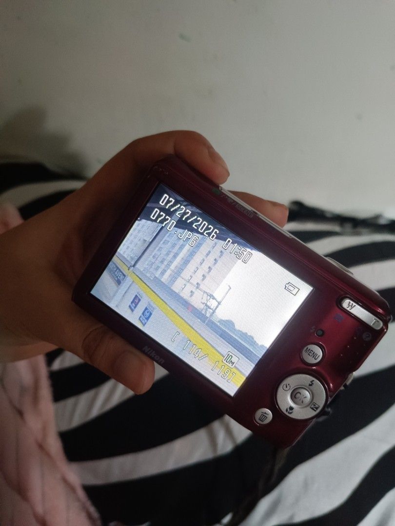 Nikon COOLPIX 10 Megapixel Digital Camera (Category: Cameras) located in General Trias. Submitted by sommii.1228 (Listing ID 1454741492, Image 2). Description: - Red Nikon COOLPIX digital camera - 10 Megapixels resolution - 3.6x optical zoom - Powered by AA batteries - Includes original wrist strap - Ideal for quick and easy snapshots.