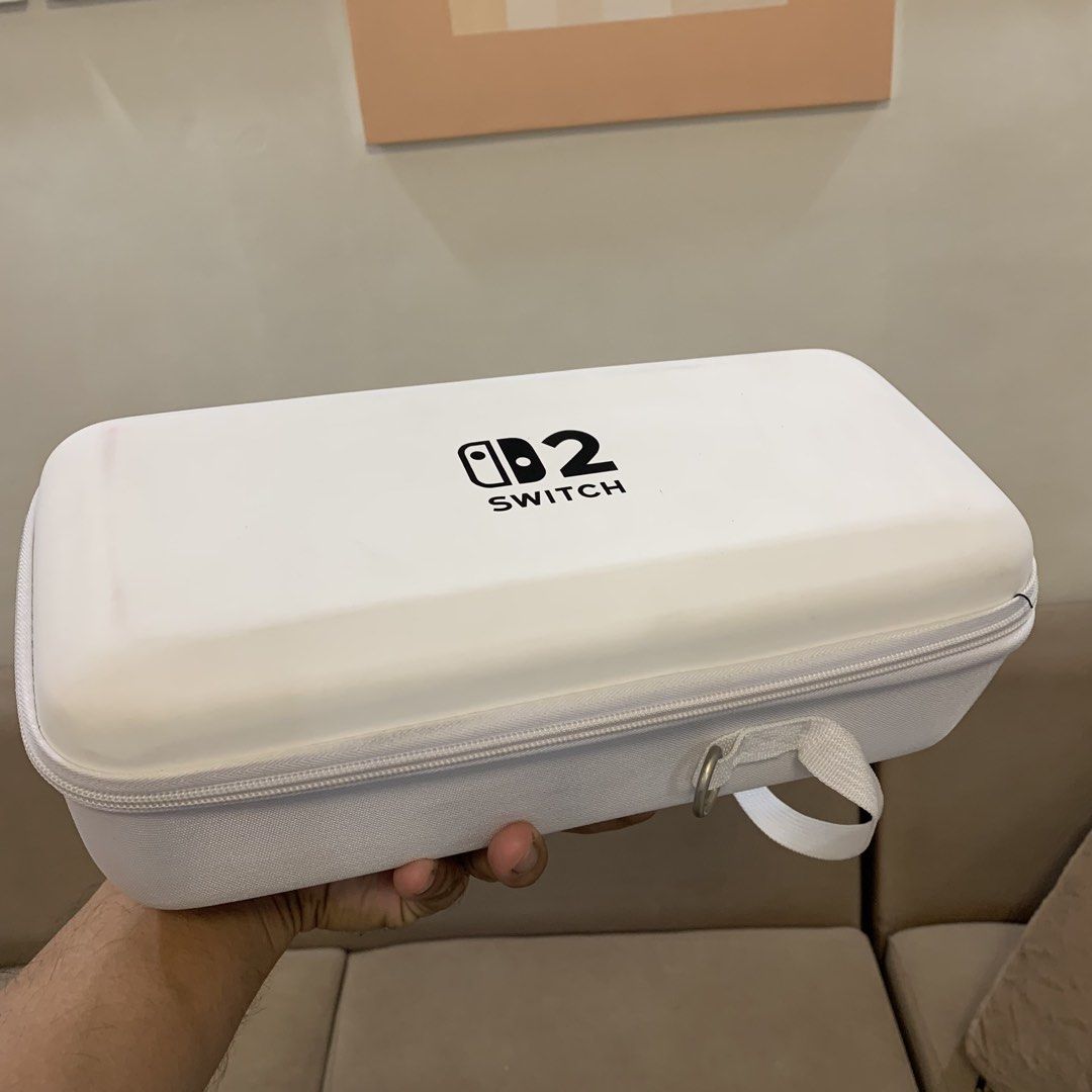 Nintendo Switch 2 Big White Pouch (Category: Cases & Covers) located in Imus. Submitted by shavogamingph (Listing ID 1454742545, Image 2). Description: ✅ Kasya po dock and charger sa loob Note: hjndi po kasama dock and charger, for demo only Good condition pa po pouch, may small stains lang po kasi puti, see pics to assess nalang po :) Compatible for Nintendo Switch 2 📍 Imus Cavite Pick up/ Meetup Lalamove 🛵 COD is Available.