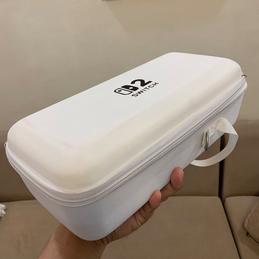 Nintendo Switch 2 Big White Pouch (Category: Cases & Covers) located in Imus. Submitted by shavogamingph (Listing ID 1454742545, Image 1). Description: ✅ Kasya po dock and charger sa loob Note: hjndi po kasama dock and charger, for demo only Good condition pa po pouch, may small stains lang po kasi puti, see pics to assess nalang po :) Compatible for Nintendo Switch 2 📍 Imus Cavite Pick up/ Meetup Lalamove 🛵 COD is Available.