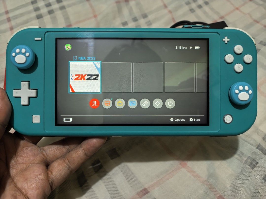 Nintendo Switch Lite (Category: Nintendo) located in Marikina City. Submitted by dearfriend_02 (Listing ID 1454694003, Image 3). Description: For Sale Nintendo Switch Lite Includes unit and orig charger. With Free thumb grip. Game Carts * NBA 2k22 * Mortal Kombat 11 * Dark Souls * Assasin's Creed Ezio Collection No issues or defects Pick-up : Dela Paz, Pasig City Thank you.