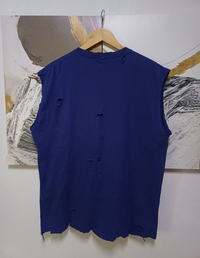 OLD PUNKS NEVER DIE DISTRESSED SLEEVE LESS SHIRT (Category: Tshirts & Polo Shirts ) located in Magalang. Submitted by itskate_cc (Listing ID 1454653476, Image 3). Description: Actual size using inches Armpit to Armpit/23 Lenght/29 fittings is Large to XL Excellent Condition, Issue:0 Message if you have any other question about sizing. A We do shipping nation wide I'm also open for video call so that you can see the item you 're interested to buy.